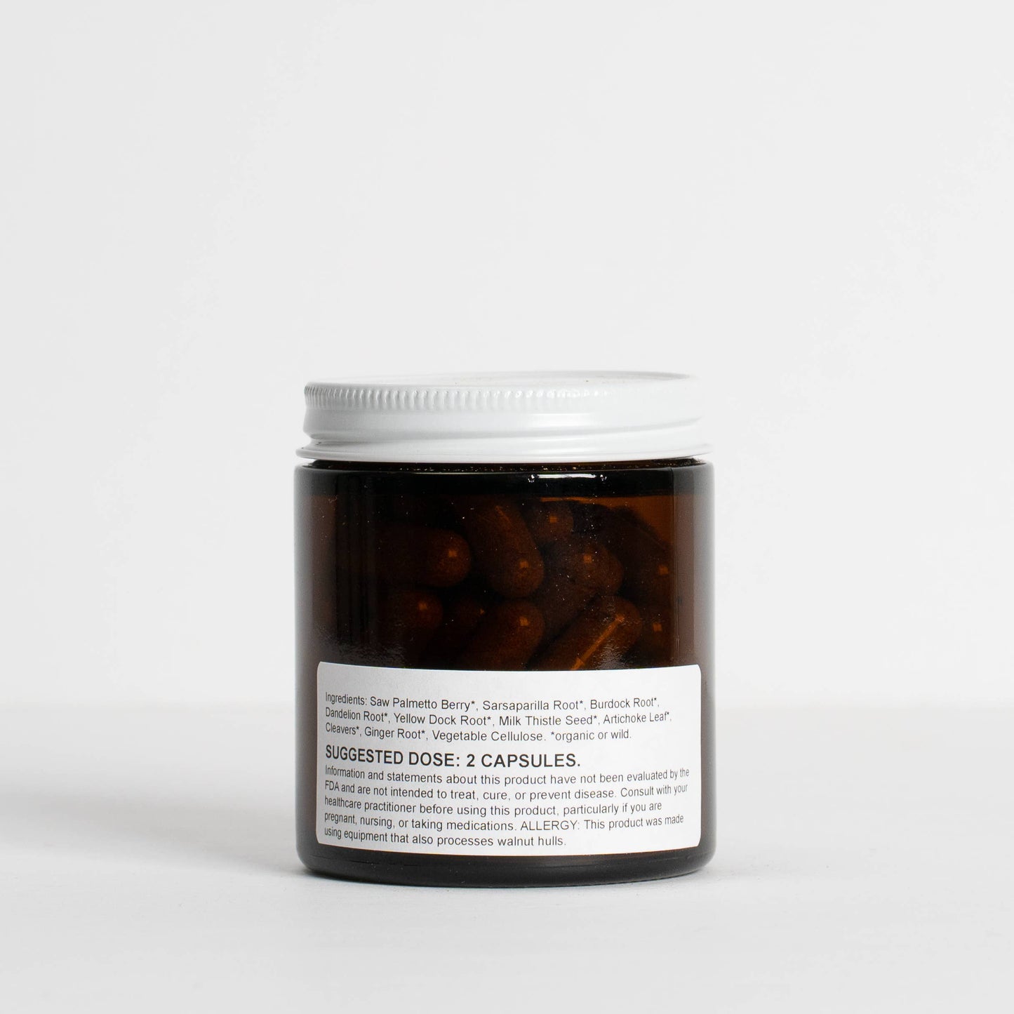 
                  
                    Food Over Drugs Cystic Acne Formula jar photographed from the back, showing the ingredient and dosage label
                  
                
